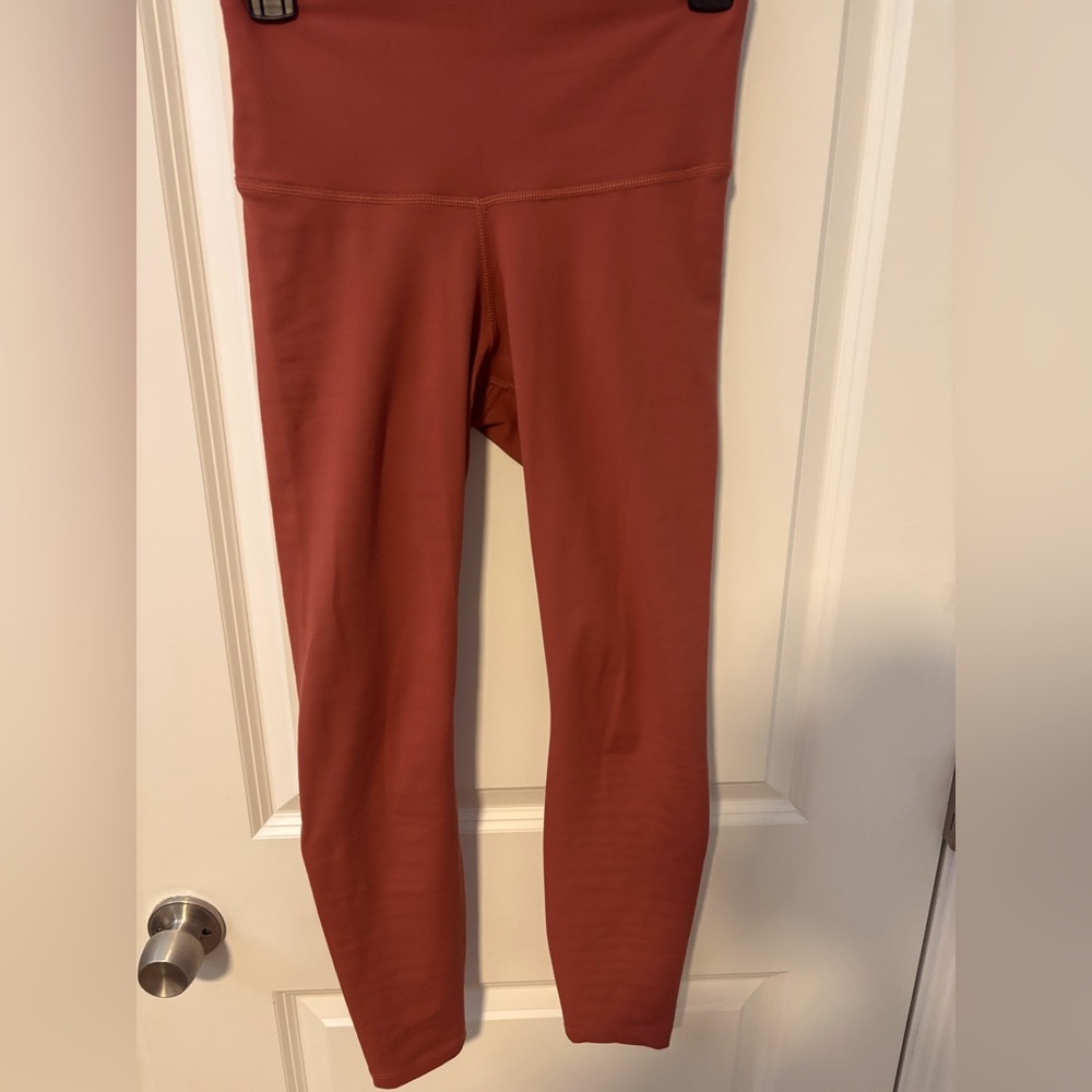Rust orange Nike leggings